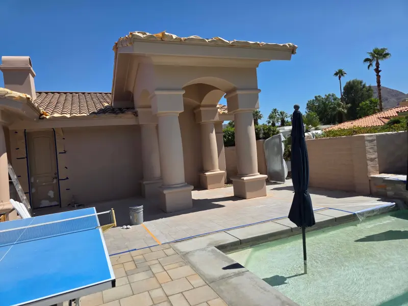 Elastomeric paint Indian Wells after with smooth uniform finish on patio columns and walls