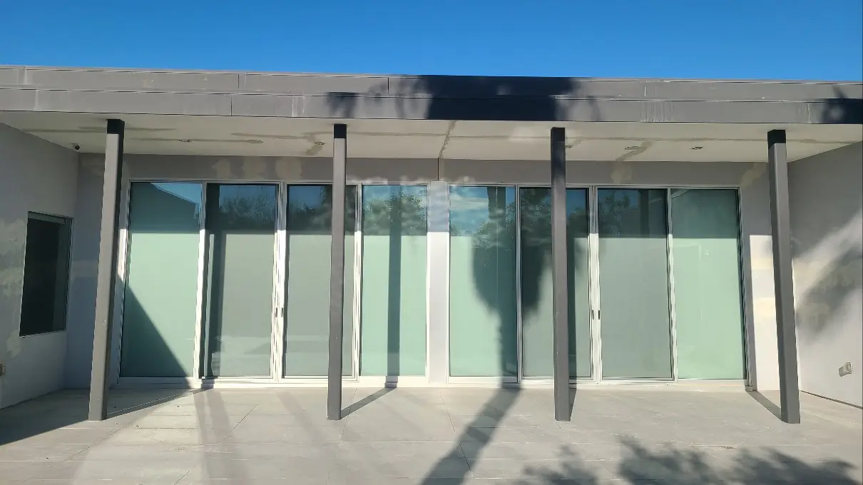 Faded stucco exterior before premium painting in Palm Springs CA