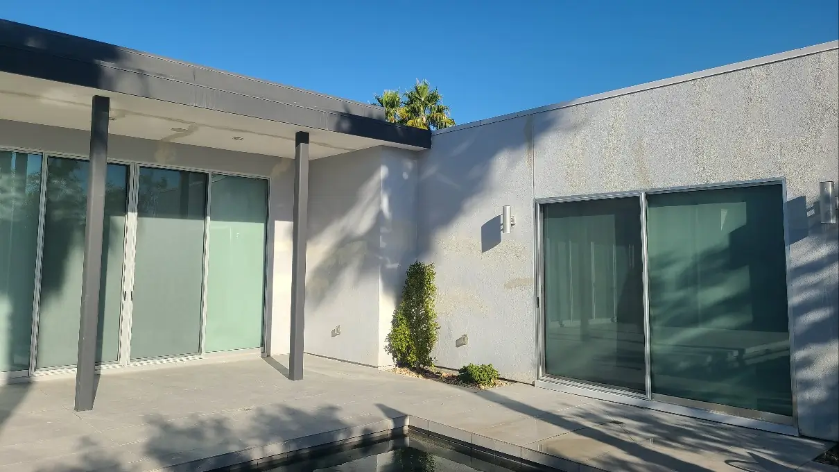 Neglected fascia and eaves on Palm Springs home before exterior painting