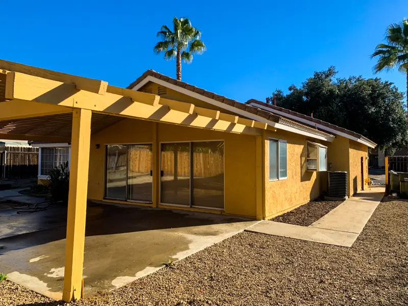 Exterior painting Redlands after — revitalized porch with fresh premium paint and restored trim
