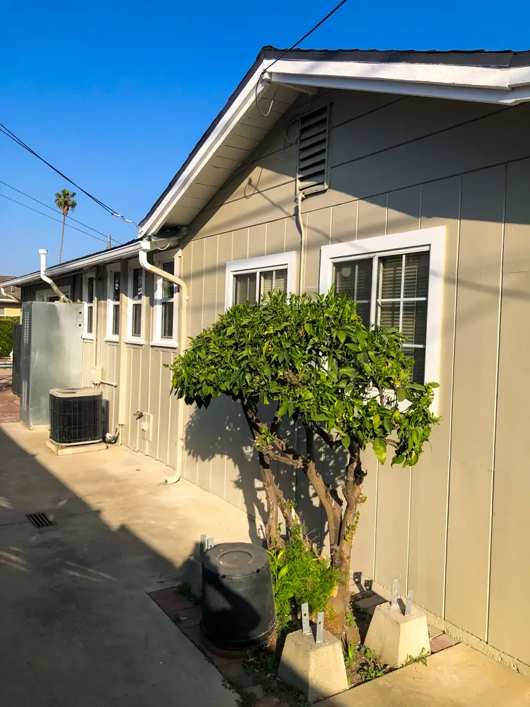 House painting San Gabriel completed with warm beige exterior and crisp white trim