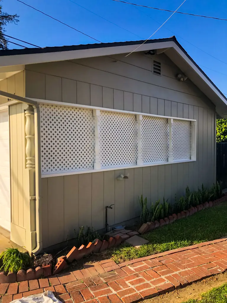 Pristine white lattice work after professional exterior painting in San Gabriel