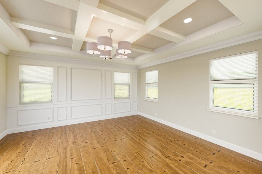 Master bedroom painting with crown molding and wood floor