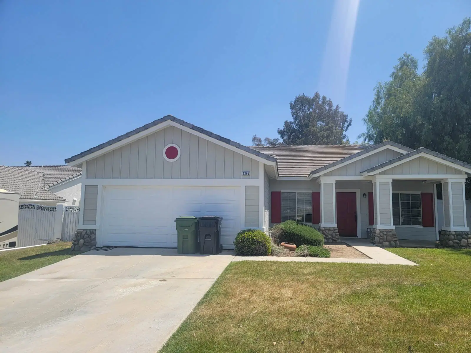 Exterior painting Rialto — freshly painted home with repaired wood and UV-resistant coating