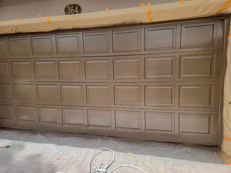 Completed garage door makeover showing enhanced curb appeal after painting by Dream Painting Orange County