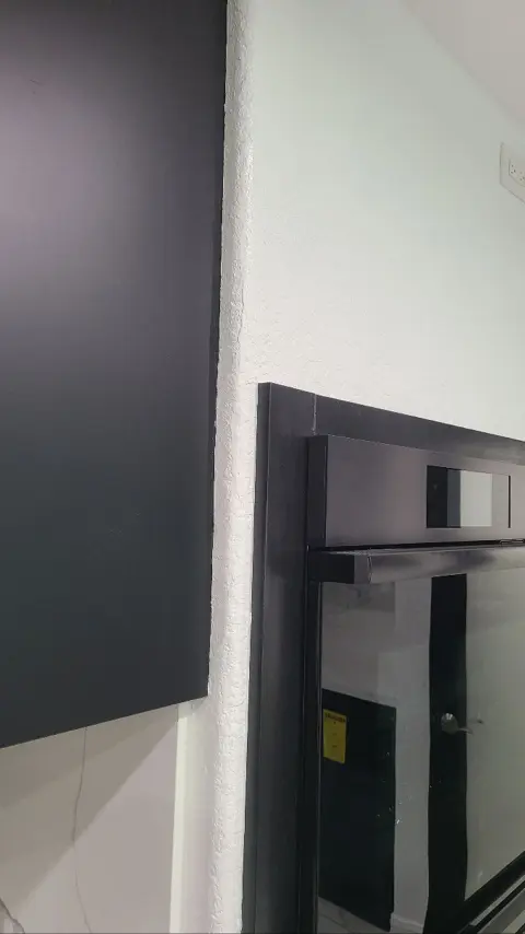 Cabinet painting Rancho Cucamonga result — freshly painted white trim, new hardware, and modern color scheme